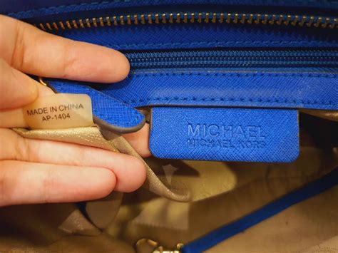 how to tell a real michael kors bag|michael kors authentication serial number.